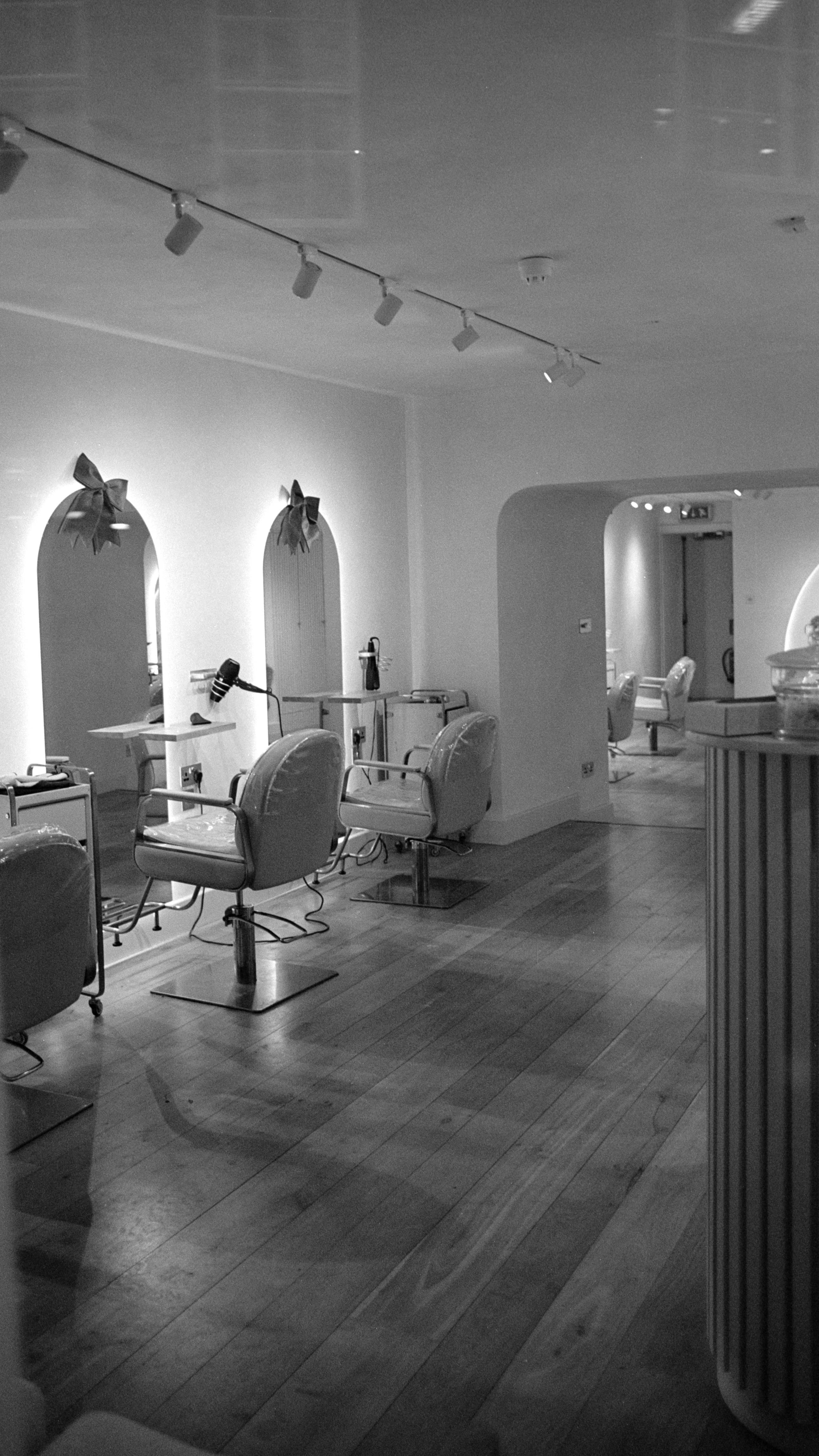 Minimal black and white salon interior