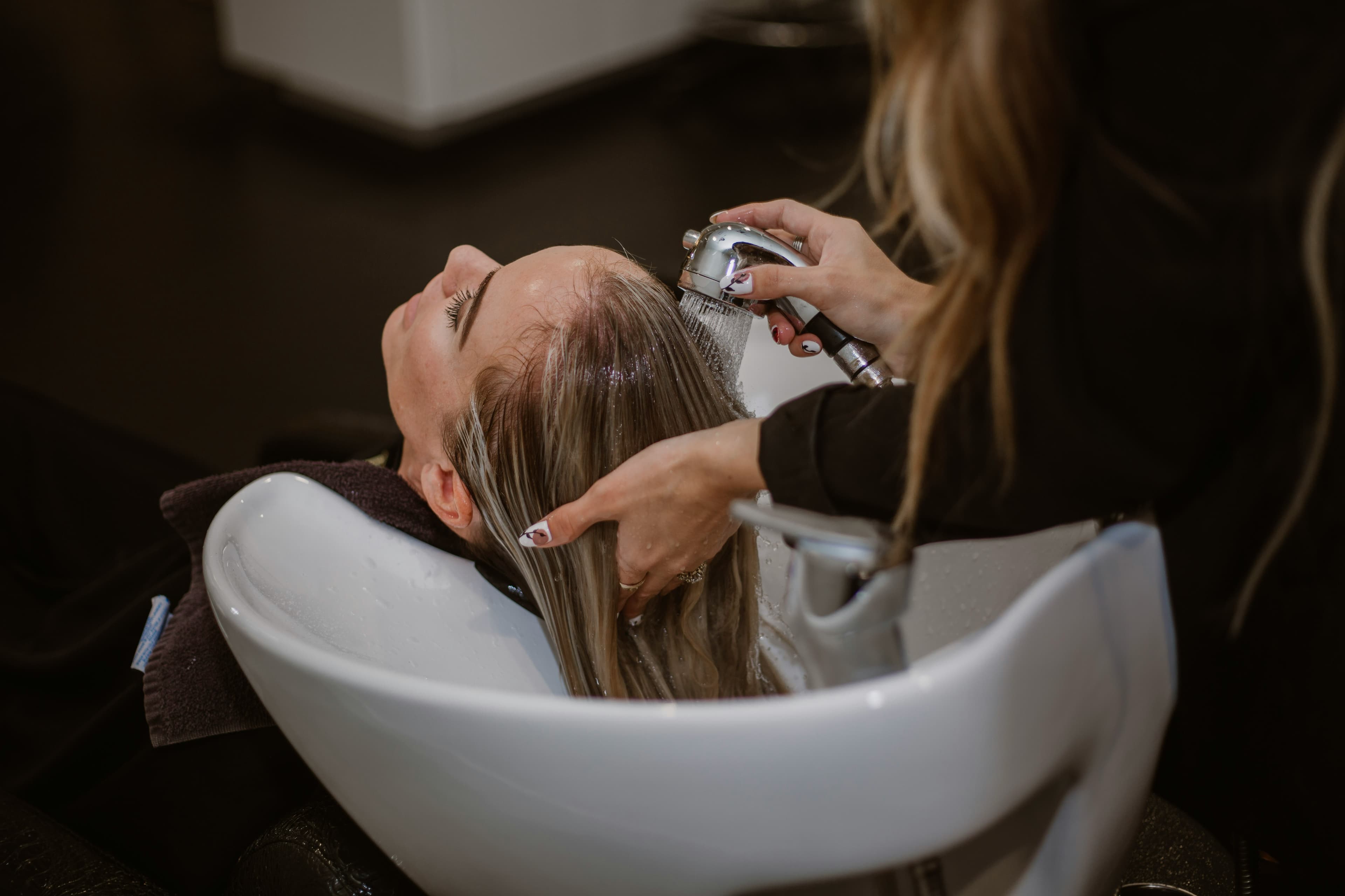 Client receiving a relaxing treatment at the salon